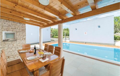 Πισίνα στο ή κοντά στο Two-Bedroom Apartment In Veli Rat
