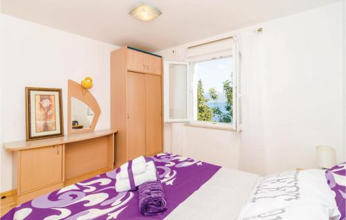 Postel nebo postele na pokoji v ubytování Cozy Home In Sipan With Outdoor Swimming Pool