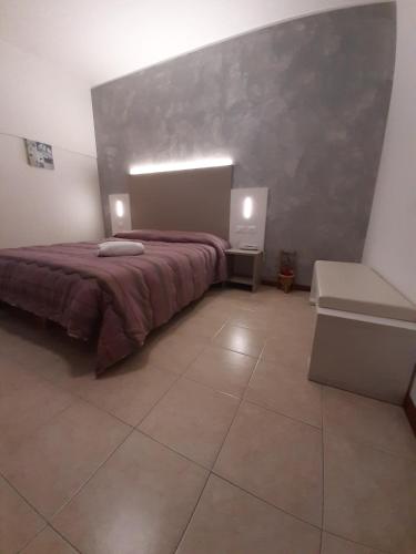 Postel nebo postele na pokoji v ubytování Hotel Venezia