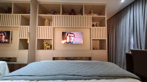 Cama ou camas em um quarto em Conforto e sofisticação à 500m da Vila Germânica