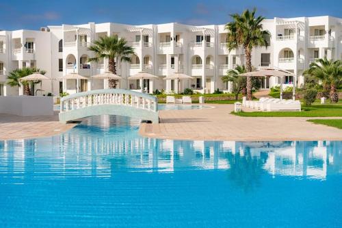 a view of the resort from the pool at Cap Bon Kelibia Beach Hotel & Spa in Kelibia