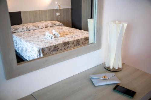 Ένα ή περισσότερα κρεβάτια σε δωμάτιο στο LUZIA AGRIRESORT Amazing Nature Atmosphere