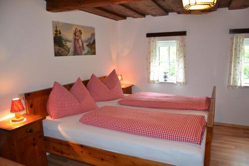 Cama o camas de una habitación en Ferienhaus Häuslbauer