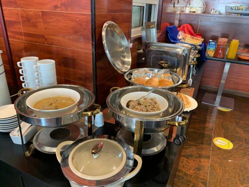 a group of food items on display in a kitchen at Rivethi Beach in Hulhumale