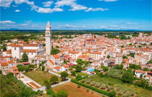 an aerial view of a city with a clock tower at Holiday Home Butkovici Croatia in Butkovići
