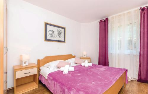 Cama o camas de una habitación en Nice Apartment In Novi Vinodolski With Wifi