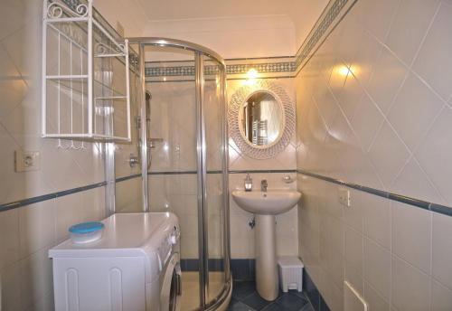 a bathroom with a shower and a sink and a toilet at Braschi Amalfi Dreams in Minori