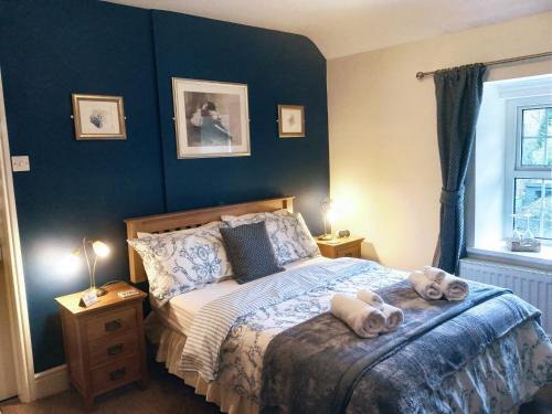 Ένα ή περισσότερα κρεβάτια σε δωμάτιο στο Oakfield Guest House