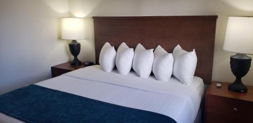 Postel nebo postele na pokoji v ubytování Los Viajeros Inn