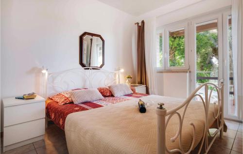 Krevet ili kreveti u jedinici u okviru objekta Amazing Apartment In Pula With House Sea View