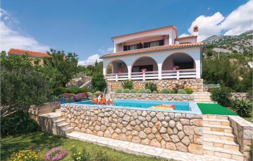 a house on a hill with a swimming pool at Cozy Home In Lukovo Sugarje With Wifi in Barić Draga