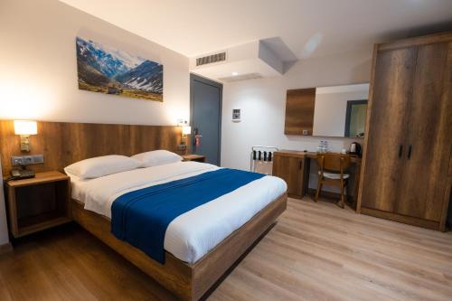 Cama o camas de una habitación en REF İNN HOTEL