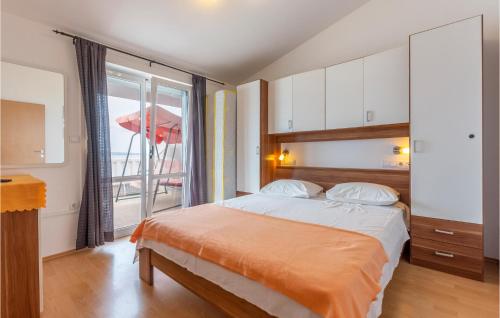 Postel nebo postele na pokoji v ubytování Apartment Jesenice With Sea View Ii