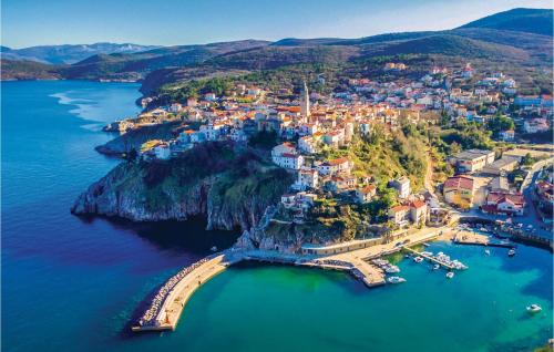 an aerial view of a town on an island in the water at Cozy Apartment In Vrbnik in Vrbnik