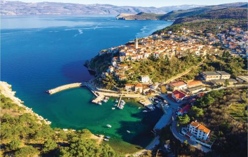 an aerial view of a small town on a lake at Cozy Apartment In Vrbnik in Vrbnik