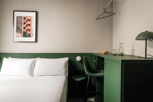 Un ou plusieurs lits dans un hébergement de l'établissement BYPILLOW Mothern