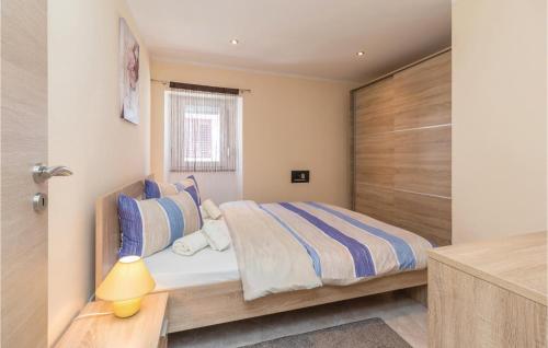 Posteľ alebo postele v izbe v ubytovaní Two-Bedroom Holiday Home In Zadar