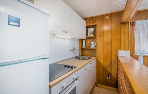 a kitchen with a sink and a counter top at 2 Bedroom Gorgeous Home In Baska in Baška