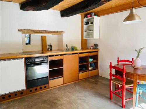 Kuchyň nebo kuchyňský kout v ubytování Idyllisches Studio Scaiano