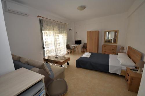 Postel nebo postele na pokoji v ubytování APOSTOLIAS APARTMENTS