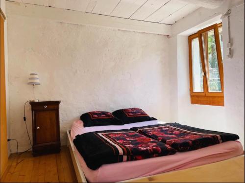 Postel nebo postele na pokoji v ubytování Idyllisches Studio Scaiano