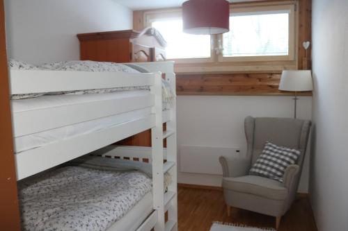 Una cama o camas en una habitación de Biohof Schmiedbauer