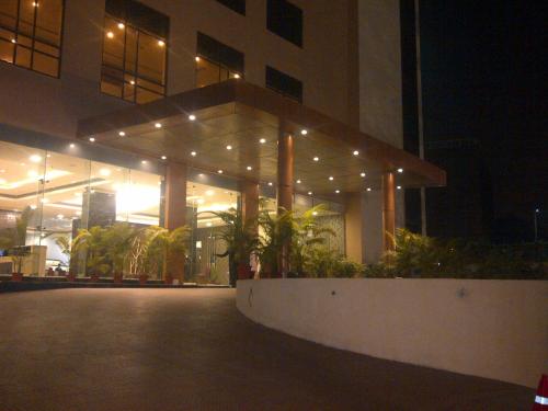 a building at night with lights on it at Ramada Jamshedpur Bistupur in Jamshedpur