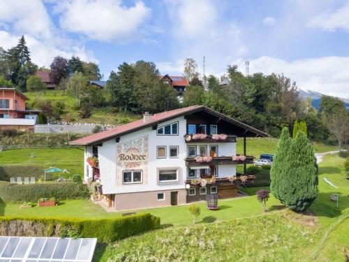 an aerial view of a house with a solarium at Spacious Apartment in Afritz am See near Ski Area in Afritz
