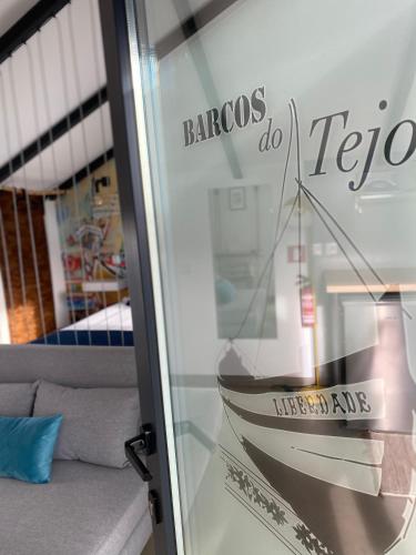 a glass door with a picture of a boat on it at Villa Rio by Valada Village in Valada