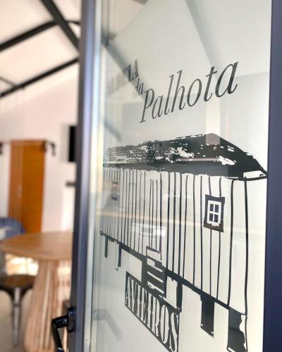 a glass door with a sign that reads the palindula apartments at Villa Rio by Valada Village in Valada