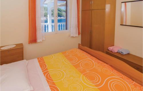Un pat sau paturi într-o cameră la Stunning Home In Vela Luka With Kitchen