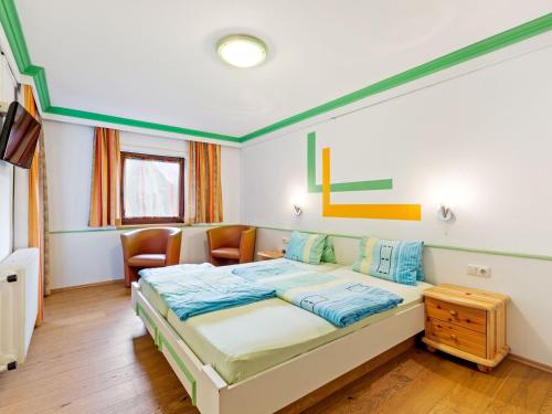 Cama o camas de una habitación en Apartment in Saalbach Hinterglemm near Ski Area