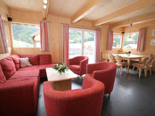 A seating area at Chalet Hohentauern by Ski Lift