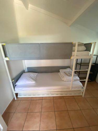 Katil dua tingkat atau katil-katil dua tingkat dalam bilik di Vakantiehuisje Wenduine