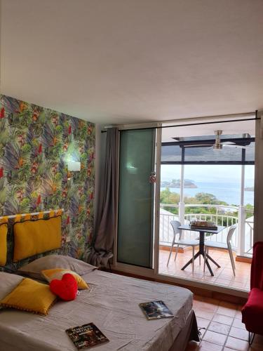 Postel nebo postele na pokoji v ubytování Vous rêvez de soleil ! studio Abricot 309