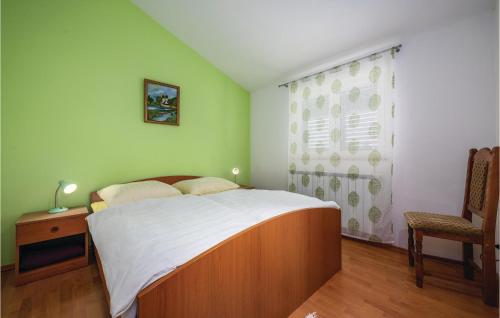 Katil atau katil-katil dalam bilik di Two-Bedroom Apartment In Svlovrec