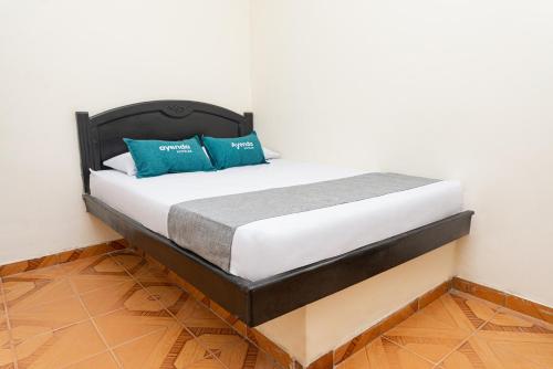 Posteľ alebo postele v izbe v ubytovaní Ayenda Itaka