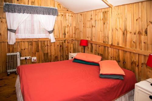 Ένα ή περισσότερα κρεβάτια σε δωμάτιο στο Jikeleza Lodge