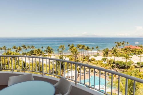 a view of the beach from the balcony of a resort at Fairmont Kea Lani, Maui in Wailea
