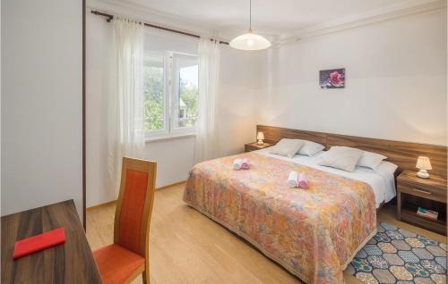 Katil atau katil-katil dalam bilik di 2 Bedroom Nice Apartment In Lovrecica