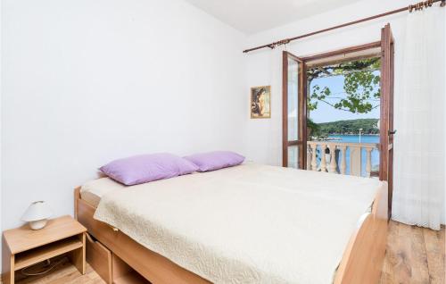 Ein Bett oder Betten in einem Zimmer der Unterkunft 2 Bedroom Gorgeous Apartment In Gruda