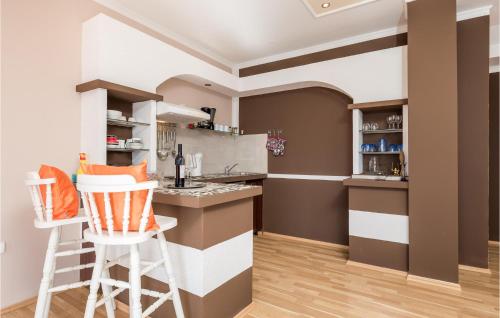 Kuchyň nebo kuchyňský kout v ubytování Gorgeous Apartment In Lovran