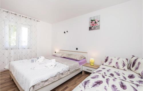 A bed or beds in a room at Pet Friendly Home In Rijeka With Wifi