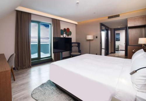 Ένα ή περισσότερα κρεβάτια σε δωμάτιο στο Radisson Blu Hotel, Mount Erciyes