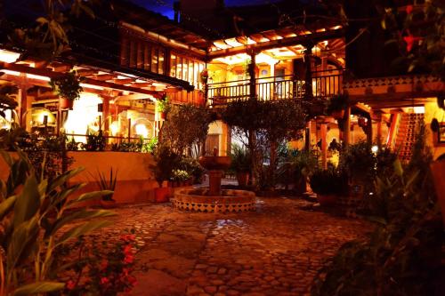 Κήπος έξω από το Hotel La Posada de San Antonio