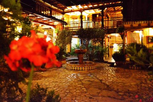 Κήπος έξω από το Hotel La Posada de San Antonio
