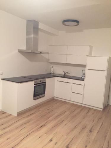 Una cocina o zona de cocina en Apartments Torggl