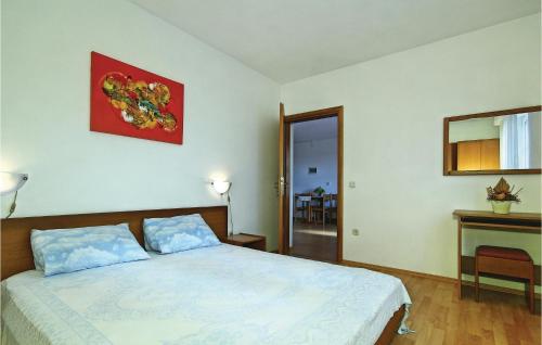A bed or beds in a room at Lovely Apartment In Tar-vabriga With Kitchen