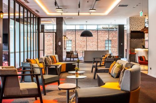 Гостиная зона в Holiday Inn Express Melbourne Little Collins by IHG