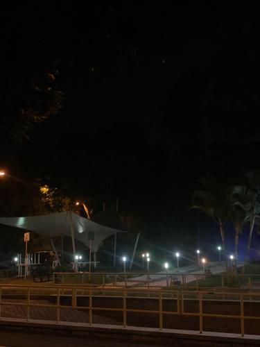 a building with a tent at night with lights at Apartamento amoblado nuevo in Pereira